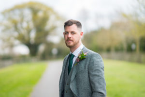 Groom in tweed suit at Applewood Hall