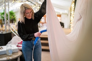 Bottom Drawer Bridal preparing wedding dress at Applewood Hall