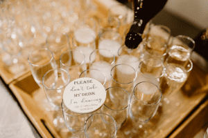 Welcome your evening wedding guests with a drink