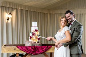 Four tier wedding cake with flower decoration