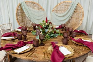 Rustic top table with peacock chairs