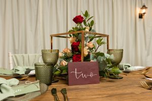 Table centre arrangement with seasonal winter blooms