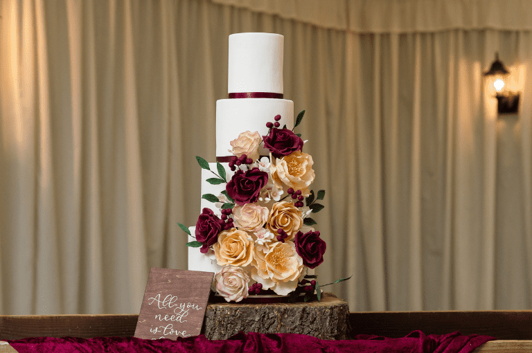Professional wedding cake baker and recommended supplier, Claire's Custom Cakes